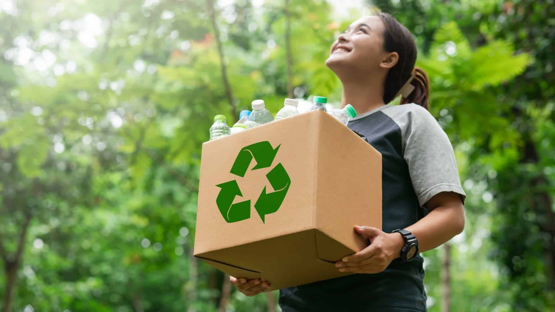 Person recycling bottles